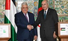 عباس برفقة الرئيس الجزائري