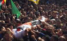 أثناء تشييع جثمان الشهيد حسن البو في الخليل