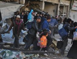 آلاف السوريين يعودون إلى "حمص المدمّرة" 