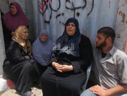  أم أيمن الرزاينة وذويها