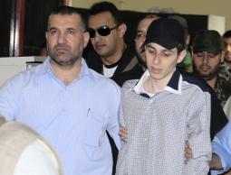 الجعبري وشاليط خلال تنفيذ الصفقة