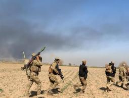 جنود عراقيون أثناء اشتباك مع تنظيم الدولة في الموصل 