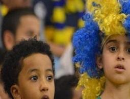 طفل يشجع فريق النصر السعودي