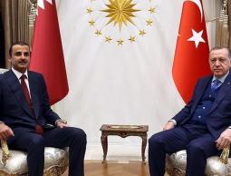 أردوغان يمينا وبجانبه تميم