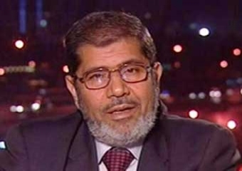 محمد مرسي، عضو مكتب الإرشاد بجماعة الإخوان المسلمين 