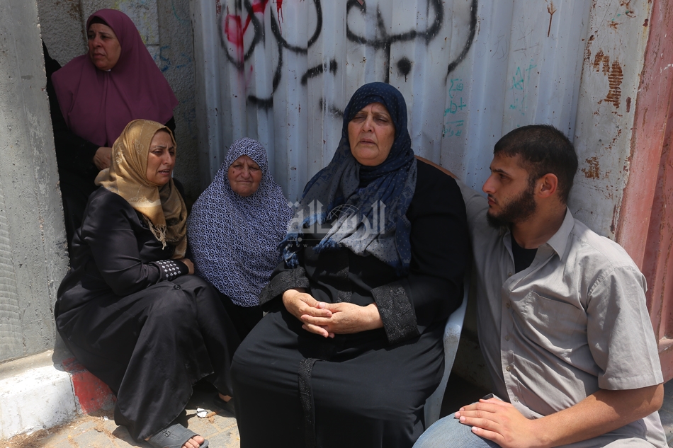  أم أيمن الرزاينة وذويها