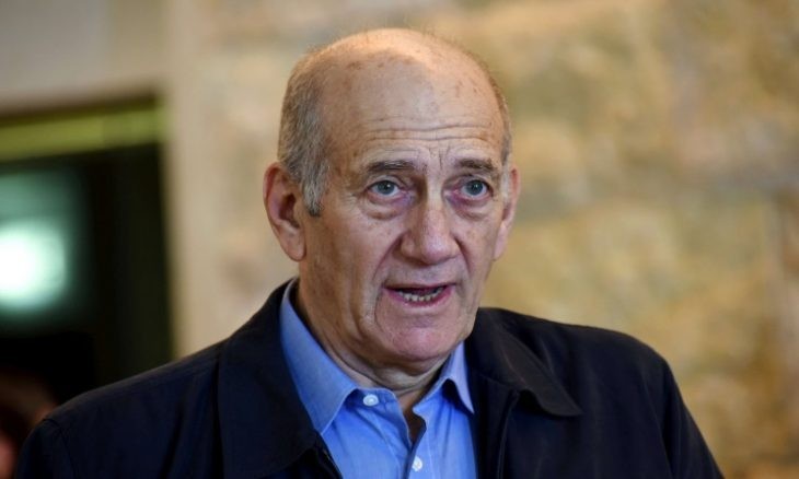 أولمرت يخشى اعتقاله في سويسرا