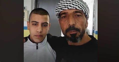 الطفل آيهم السلايمة مع والده