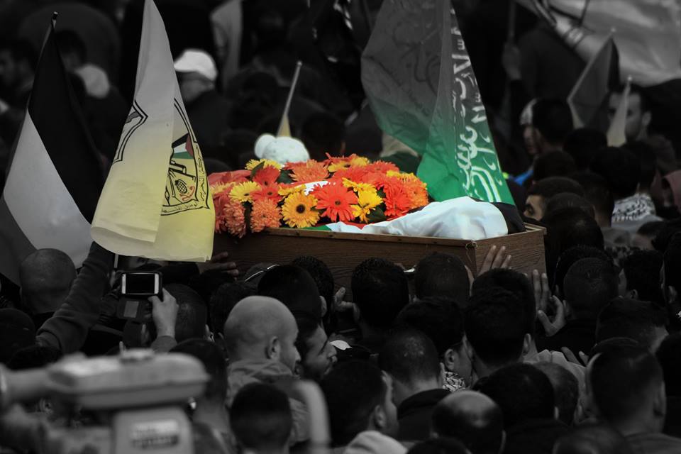 خلال تشييع جثمان الشهيدة