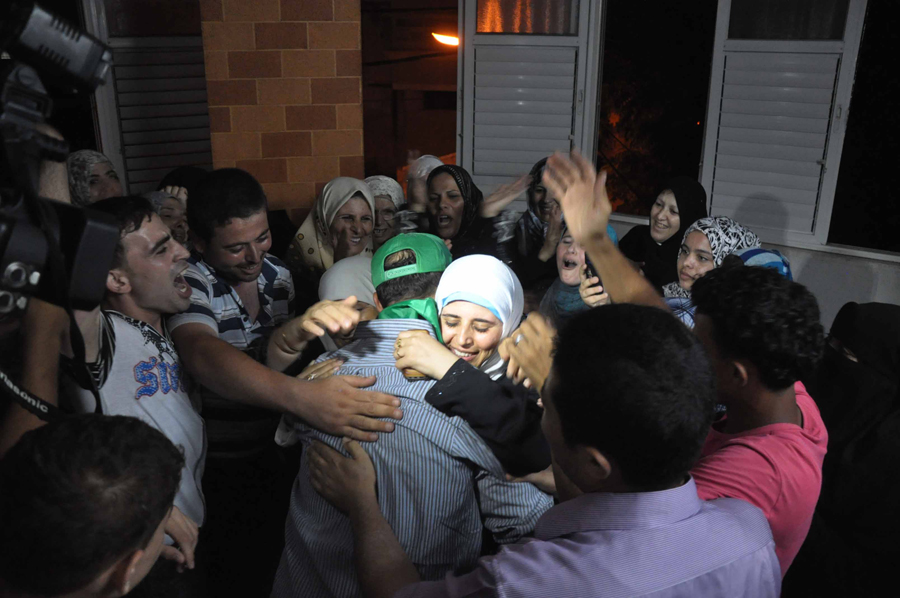 استقبال الأسرى بغزة (تصوير محمد الثلاثيني)