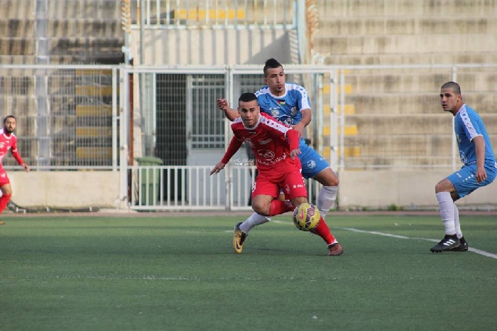 جانب من مباراة سابقة بين هلال القدس وثقافي طولكرم